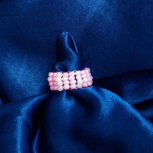 pink and white beaded ring